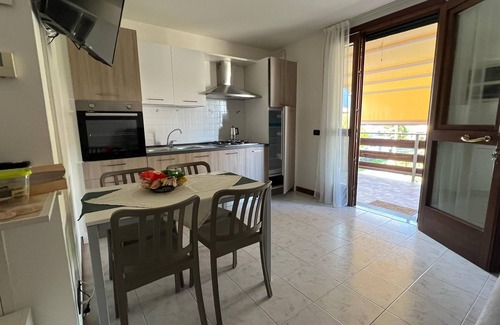 Castello d'Aviano Apartamento | "IL CASTELLETTO" independent apartment, 2 terraces, garden with bbq.