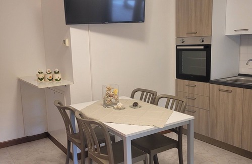 Castello d'Aviano Apartamento | "IL CASTELLETTO" independent apartment, 2 terraces, garden with bbq.