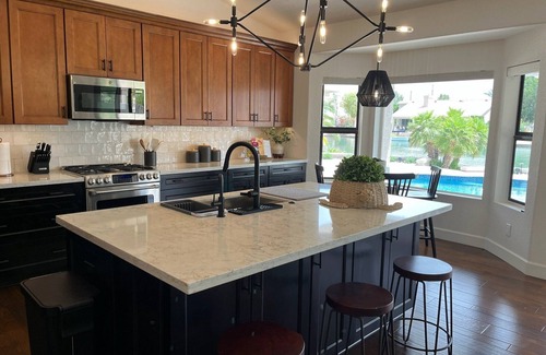 Crystal Shores Casa | IMPRESSIVE Val Vista Lake front w/VIEW: Heated Pool, Patio TV, Fishing
