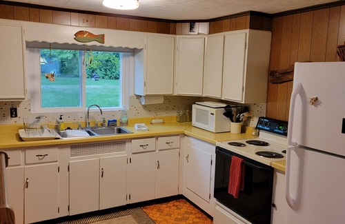 Lake Leelanau Cabaña | In the narrows on Lake Leelanau, pet friendly, sleeps 8, and a dock!