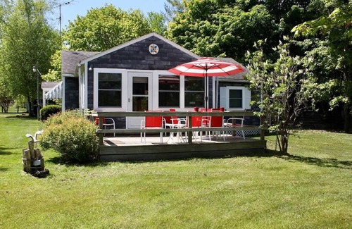 Lake Leelanau Cabaña | In the narrows on Lake Leelanau, pet friendly, sleeps 8, and a dock!