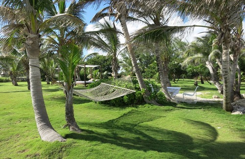 Silver Sands Casa | Inchcape Seaside Villas justo en Silver Sands Beach - 2 dorm. Patio de la casa,
