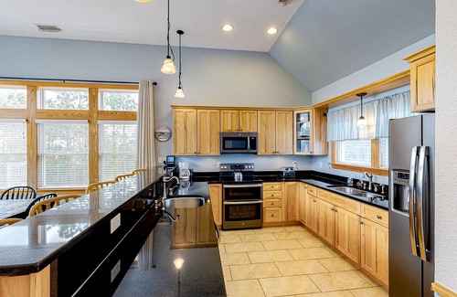 Wind Over Waves Casa | Incredible two-story home with private pool, hot tub, & game room
