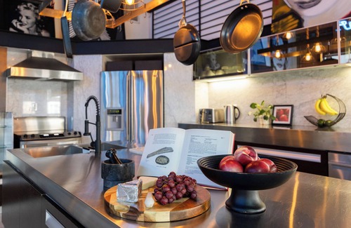 Historic Core Casa | Industrial-Chic DTLA Loft with Rooftop & City Views | Skyline Lofts by AvantStay