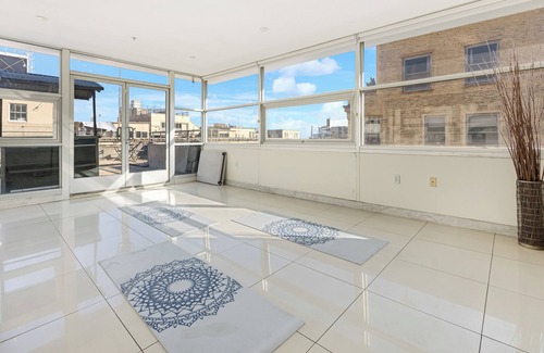 Historic Core Casa | Industrial-Chic DTLA Loft with Rooftop & City Views | Skyline Lofts by AvantStay