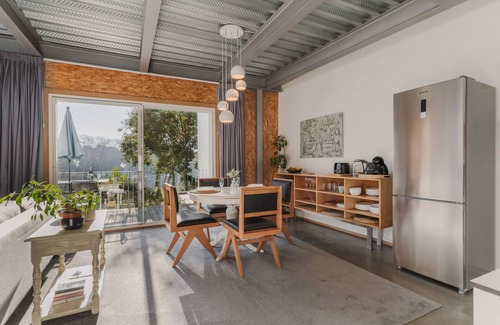 Uniao de Freguesias do Centro Apartamento | Apartamento de diseño industrial en el centro con jardín compartido, Wi-Fi y aire acondicionado