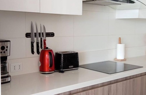 Renaca Apartamento | Infinite Coast 2BR with pool, gym & free parking