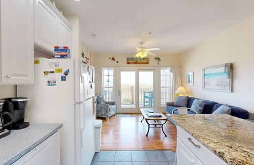 Hatteras Condominio | Inviting beachfront condo featuring hot tub & pool, central AC, elevator, & deck