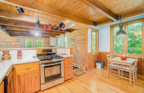 Benzonia Casa | Inviting home in great location with large deck, firepit, gas grill & streaming