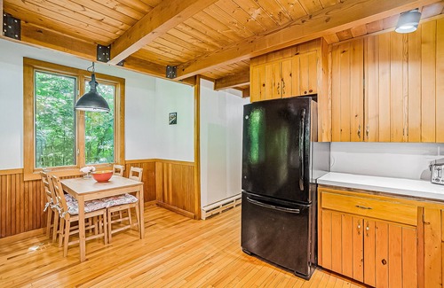 Benzonia Casa | Inviting home in great location with large deck, firepit, gas grill & streaming