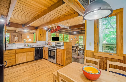 Benzonia Casa | Inviting home in great location with large deck, firepit, gas grill & streaming