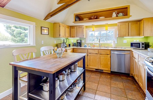 Westhaven-Moonstone Casa | Inviting home with water view, enclosed yard, hot tub, firepit, & W/D