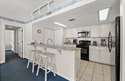 West Panama City Beach Condominio | IRRESISTIBLE: TODO VIDRIO! 1400 pies cuadrados 'GOLF FRT! 2Br 2B, ¡JUEGO DE PLAYA GRATIS DE MAR A OCTUBRE!
