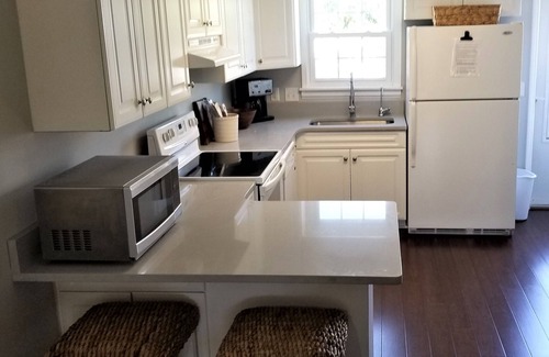 Surfside Beach Casa | Island House D : Stylish Updated Townhome - Steps to the Beach w/ Pool!