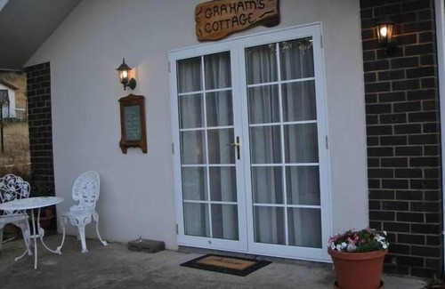 Riverside Cabaña | Cottage Country Style de Isla Vistas-Graham