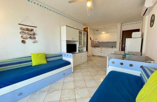 Porto Santa Margherita Apartamento | Lovely flat with sunny terrace