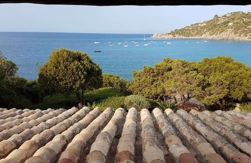Torre delle Stelle Villa | PIES DE VILLA EN EL AGUA, ACCESO DIRECTO A LA PLAYA, VISTA PANORÁMICA, 10 PERSONAS.