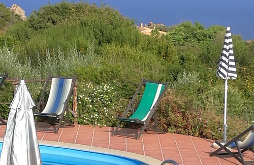 Costa Paradiso Casa | La Casa Blanca, el mar y la costa del paraíso, Cerdeña
