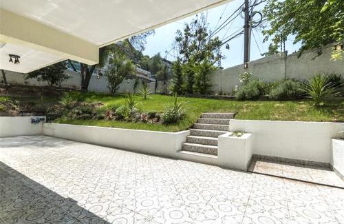 El Golf Apartamento | Jardín privado para familias y trabajo