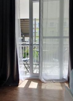 Mactan Export Processing Zone Apartamento | JC SpaceRentals 127B Amani Grand Resort Residences, balcony pool view, Ground floor, 5 mins frm airport, free wifi, Netflix