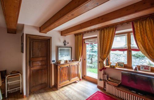 Dolonne Apartamento | JOIVY Big Flat for 6 with Backyard and Parking in Courmayeur