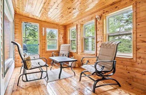 Aldersville Cabaña | June's Haven" is a picturesque lakeside cottage perfect for fishing