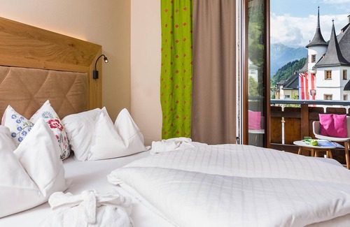 Zell am See Hotel | Junior Suite, ducha o baño, WC, sala de estar / dormitorio - Zum Hirschen, Hotel