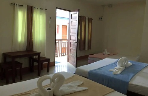 Tawala Cama Y Desayuno | Junlyn ApartelleDeluxe Double or Twin room
