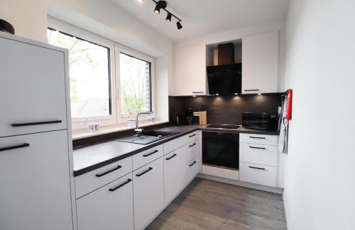Tossens Apartamento | KÜSTE33/38 - strandnah mit Sauna & Balkon direkt an der Küste!