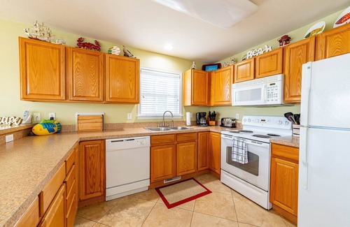 Colington Harbour Casa | K1552 BeachBumz. Gran Canalfront Home con piscina comunitaria.