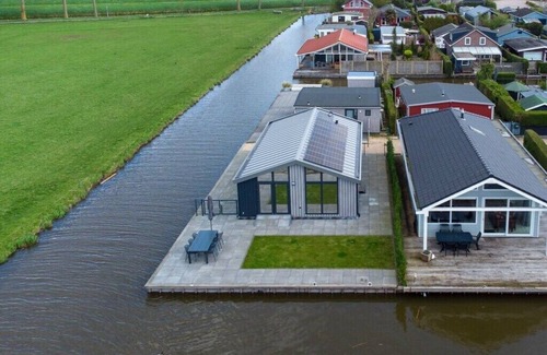 Onderdijk Chalet De Esquí | Karper Vakantiepark De Groote Vliet