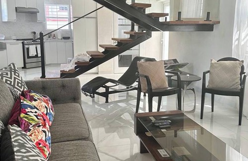 Prospect Casa | Relájate y descansa en este espacio tranquilo y elegante