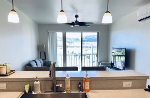Ewa Condominio | King Bed w/ pool. Prime Location. Assigned Parking. Family Friendly!