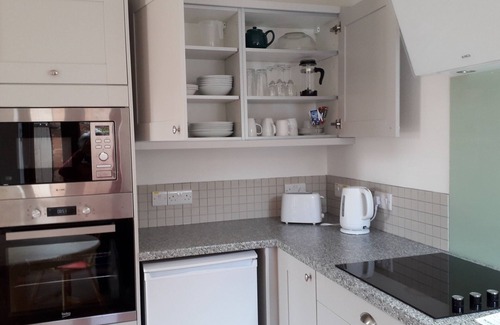 Clyst Saint George Apartamento | The Roost-Apartamento-Baño con ducha-Vista al patio
