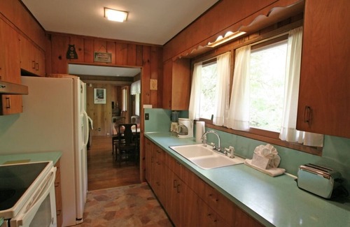 Gatlinburg Cabaña | Kingfisher-River Front Property walking distance to Downtown Gatlinburg!