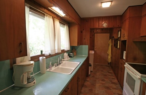 Gatlinburg Cabaña | Kingfisher-River Front Property walking distance to Downtown Gatlinburg!