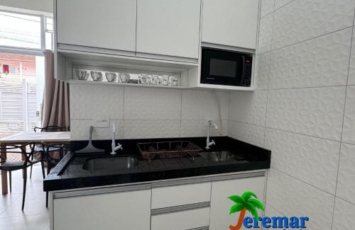 Estufa II Apartamento | kitinet's com Ar Condicionado