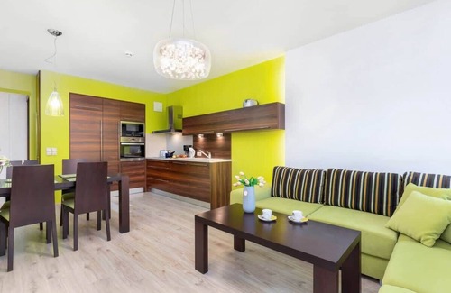 West Pomeranian Voivodeship Apartamento | Kościuszki 16 | Lime and Brown Apartment | Balcony
