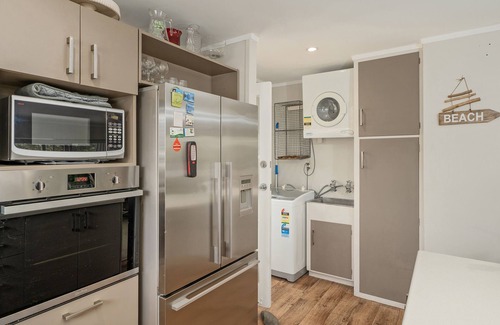 Whiritoa Casa | Kon Tiki Retreat - Whiritoa Beach Holiday Home