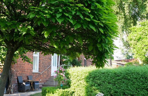 Syke Apartamento | Ländliche Ferienwohnung im Idyllischen Bauerngarten