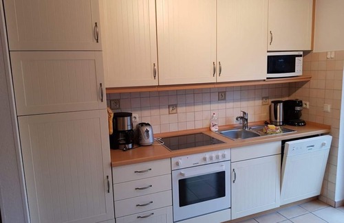 Tossens Apartamento | Lüttjes Diekhuus - Ferienwohnung Strandkorb