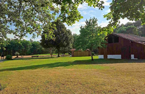 Leon Casa | L'Airial de Léon: 2 casas, piscina, naturaleza, gimnasio y sala de juegos