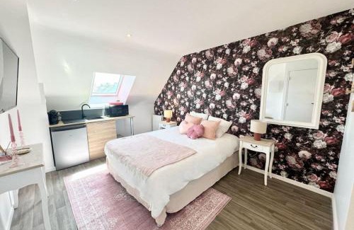 Queven Apartamento | L’instant rose - Cocon fleuri avec jacuzzi