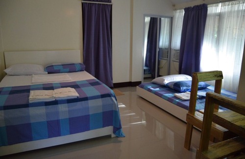 Baler Cama Y Desayuno | La Casa Blanca junto a la playa - Empacadora