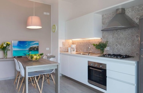 Magugnago Apartamento | Apartamento La Maison Blanche en Brenzone - 2 personas, 1 dormitorios