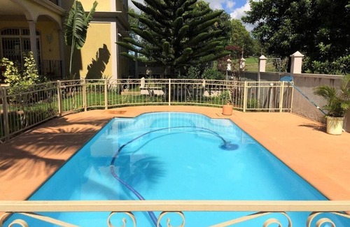 Mahebourg Apartamento | 2 apartamentos individuales muy espaciosos con piscina segura y jardín tropical