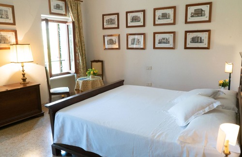Colognola ai Colli Villa | La casa de campo rosa y el león