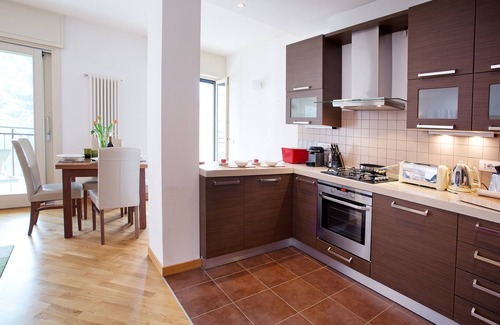 Laglio Apartamento | Laglio Ribolla Azzuro Elegante y moderno apartamento con vista al lago y piscina.