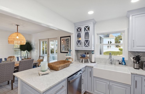 Pelican Bay Casa | Lagoon view, screen porch w/ swing bed, Pool, near beach - 3 Pelican Bay