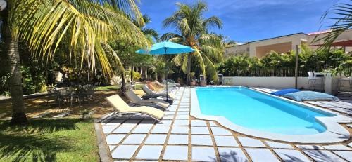 Tamarin Apartamento | LAKAZ DEL SOL - Modern and elegant apartments with luxurious garden, pool and barbecue area - Tourism Permit Certified